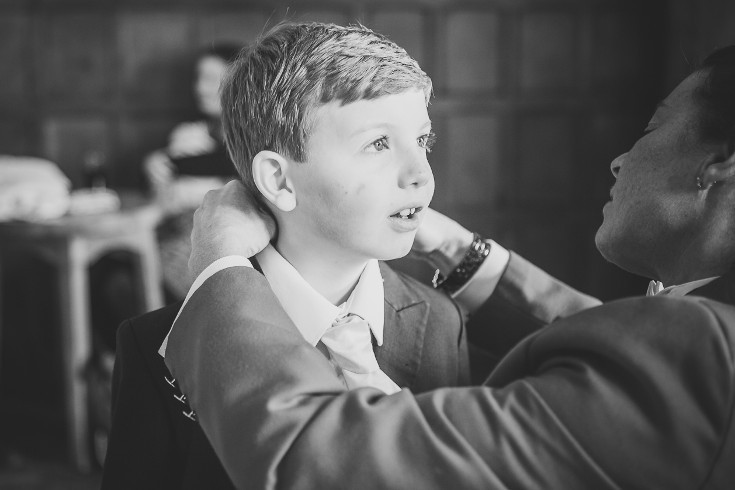 Wedding toastmaster working with page boy
